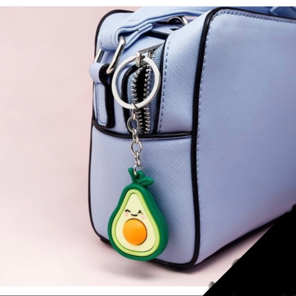 Cute avocado keychain or purse charm. 3 styles: Red bow, purple bow, red wink